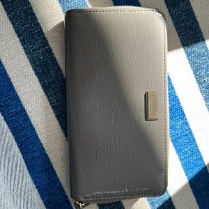 Kate Spade grey glossy zip around wallet